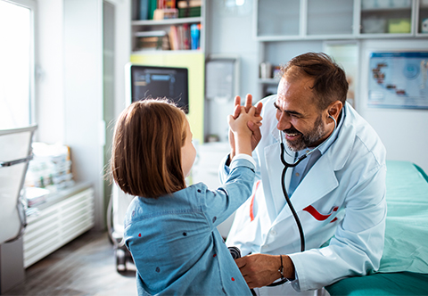 Photo of a doctor with a young patient