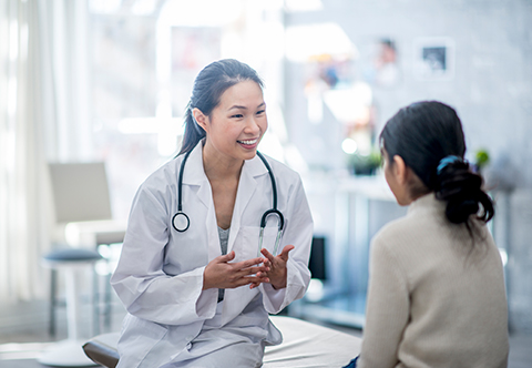 Doctor speaking to a young patient